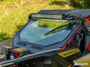 SuperATV glass windshield on a Can-Am Maverick X3, installed close-up