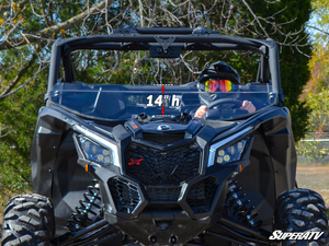 SuperATV half windshield on a Can-Am Maverick X3, side view