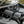 SuperATV MaxDrive Power Flip windshield on a Can-Am Maverick X3, installed close-up