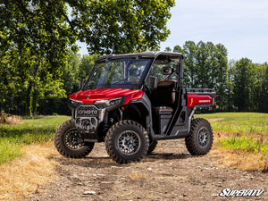 SuperATV MaxDrive power flip windshield on a CFMOTO U10 Pro, installed close-up