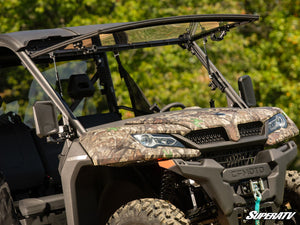 SuperATV flip windshield on a CFMOTO UForce 1000, installed close-up