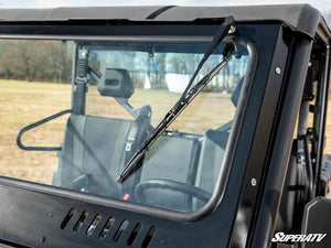 SuperATV glass windshield on a CFMOTO UForce 1000, installed close-up