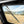 SuperATV glass windshield on a CFMOTO UForce 1000, detail view