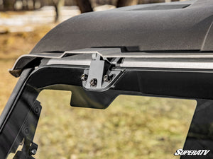 SuperATV MaxDrive power flip glass windshield on a CFMOTO UForce 1000, hardware detail