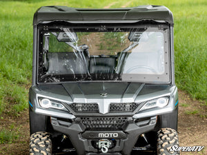 SuperATV MaxDrive power flip windshield on a CFMOTO UForce 1000, installed close-up