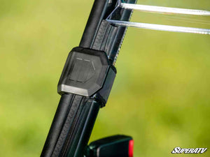 SuperATV half windshield on a CFMOTO UForce 600, installed close-up