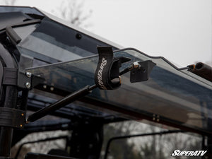 SuperATV rear flip windshield on a Honda Pioneer 1000-5, installed close-up