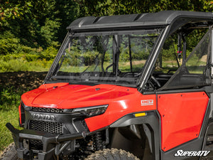 SuperATV flip windshield on a Honda Pioneer 1000, angle view