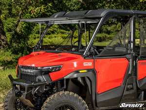 SuperATV flip windshield on a Honda Pioneer 1000, side view