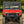 SuperATV flip windshield on a Honda Pioneer 1000, installed close-up