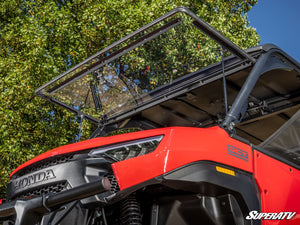 SuperATV flip windshield on a Honda Pioneer 1000, detail view