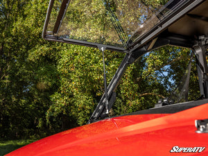 SuperATV flip windshield on a Honda Pioneer 1000, hardware detail
