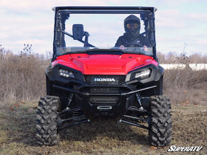 SuperATV full polycarbonate windshield on a Honda Pioneer 1000, angle view