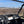 SuperATV full polycarbonate windshield on a Honda Pioneer 1000, installed close-up