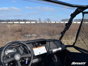 SuperATV full polycarbonate windshield on a Honda Pioneer 1000, installed close-up
