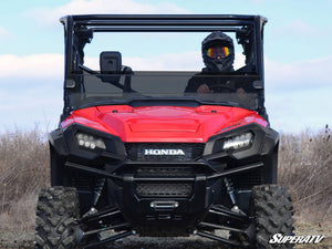 SuperATV half windshield on a Honda Pioneer 1000, side view
