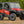 SuperATV MaxDrive power flip windshield on a Honda Pioneer 1000, side view