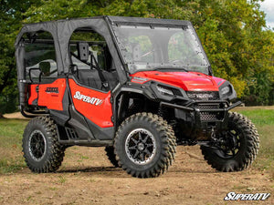 SuperATV MaxDrive power flip windshield on a Honda Pioneer 1000, side view
