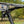 SuperATV MaxDrive power flip windshield on a Honda Pioneer 1000, mounted view