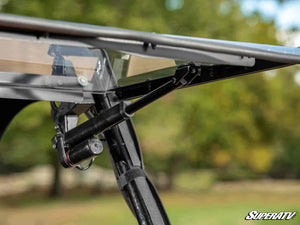 SuperATV MaxDrive power flip windshield on a Honda Pioneer 1000, mounted view