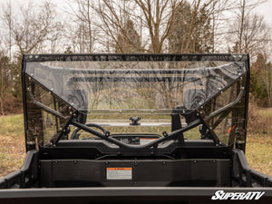SuperATV rear windshield on a Honda Pioneer 1000, installed close-up