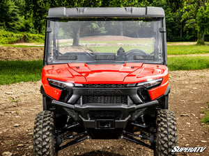 SuperATV vented full windshield on a Honda Pioneer 1000, installed close-up