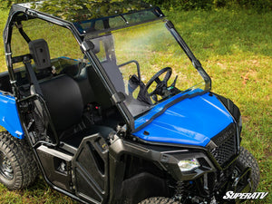 SuperATV full windshield on a Honda Pioneer 520, installed close-up