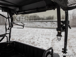 SuperATV rear windshield on a Honda Pioneer 700-4, mounted view