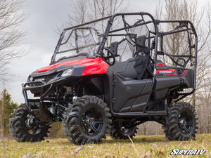 SuperATV flip down windshield on a Honda Pioneer 700, angle view
