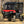 SuperATV MaxDrive power flip windshield on a Honda Pioneer 700, angle view
