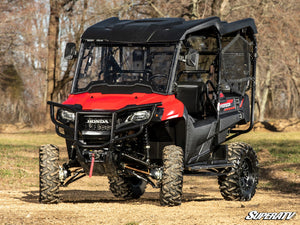 SuperATV MaxDrive power flip windshield on a Honda Pioneer 700, angle view