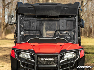 SuperATV MaxDrive power flip windshield on a Honda Pioneer 700, side view