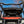 SuperATV MaxDrive power flip windshield on a Honda Pioneer 700, installed close-up