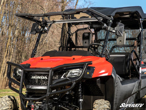 SuperATV MaxDrive power flip windshield on a Honda Pioneer 700, cab view