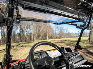 SuperATV MaxDrive power flip windshield on a Honda Pioneer 700, hardware detail