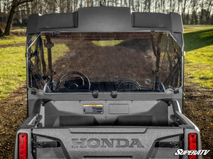 SuperATV rear windshield on a Honda Pioneer 700, side view
