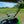 SuperATV flip windshield on a John Deere Gator, side view