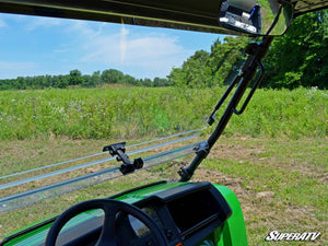 SuperATV flip windshield on a John Deere Gator, side view