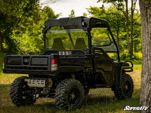 SuperATV rear windshield on a John Deere Gator 825i, angle view