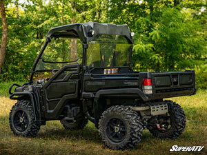 SuperATV rear windshield on a John Deere Gator 825i, side view