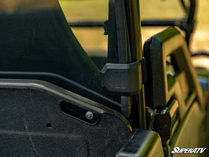SuperATV rear windshield on a John Deere Gator 825i, cab view