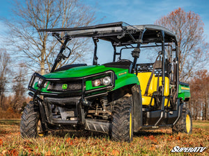 SuperATV flip windshield on a John Deere Gator XUV 590, angle view