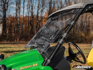 SuperATV flip windshield on a John Deere Gator XUV 590, installed close-up