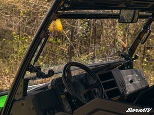 SuperATV flip windshield on a John Deere Gator XUV 835, installed close-up