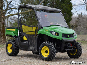 SuperATV full windshield on a John Deere Gator XUV, side view