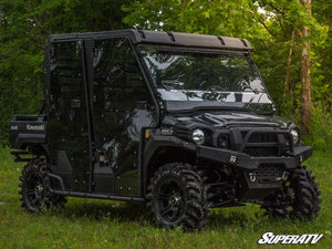 SuperATV flip down windshield on a Kawasaki Mule Pro, installed close-up