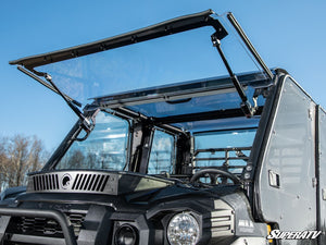 SuperATV MaxDrive power flip windshield on a Kawasaki Mule Pro, installed close-up