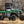 SuperATV flip windshield on a Kawasaki Mule PRO-MX, installed close-up