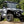 SuperATV flip windshield on a Kawasaki Ridge, installed close-up