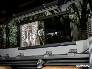 SuperATV glass sliding rear windshield on a Kawasaki Ridge, installed close-up